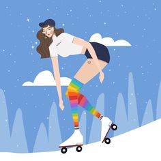 a man riding a skateboard down a snow covered slope