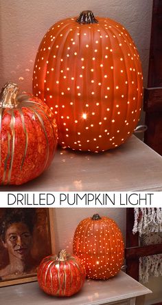 two pumpkins sitting on top of a shelf