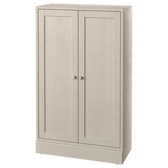 a white cabinet with two doors and drawers