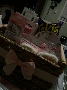 a basket filled with lots of items on top of a table