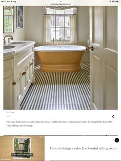 an image of a bathtub in the middle of a bathroom with striped flooring