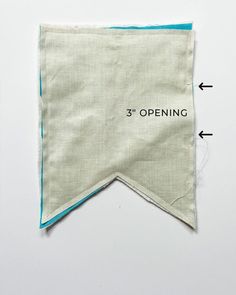 an open cloth with the word 3'opening on it