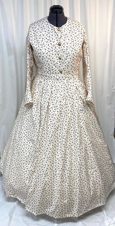 A lovely and lightweight one piece gown is perfect for your next historical event! Made of 100% cotton, this one piece, reproduction gown has a fully lined bodice, closes in the front with buttons and hook and bar, and is designed to go over a hoop/elliptical cage.  The skirt features gored panels and can be worn with or without a hoop, depending on personal/historical preference. Measurements -  Please take into account any undergarments and shoes to be worn when comparing measurements.  Bust - Long Sleeve Dresses With Historical Design For Daywear, Cotton Long Sleeve Dresses With Historical Design, Elegant Victorian Dress With Historical Design In Cotton, Cotton Victorian Dress With Fitted Bodice For Daywear, Elegant Cotton Victorian Dress With Historical Design, Long Sleeve Cotton Dresses With Historical Design, Historical Design Long Sleeve Dress For Daywear, Victorian Dress For Garden Party, Regency Style Long Sleeve Victorian Dress For Vintage Events