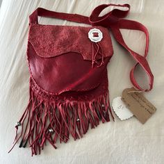 Brand New. Cute Little Red Leather Concho Bag With Fringe And Silver Beads. Red Leather Festival Bag, Everyday Red Beaded Bags, Artisan Red Hand-stitched Bags, Artisan Hand-stitched Red Bags, Traditional Red Beaded Bags, Red Hand-stitched Rectangular Shoulder Bag, Artisan Red Leather Bags, Artisan Red Shoulder Bag For Festivals, Artisan Red Bags For Festivals