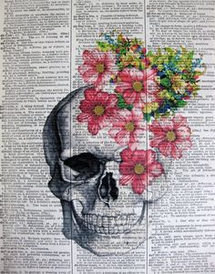 a skull with flowers in its head on top of an old book page, which has been