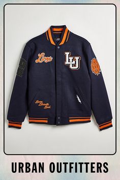 an urban outfitters jacket with the words urban outfitters written on it in black and orange