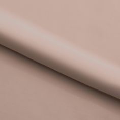 a close up view of a plain beige sheeting material that is soft and smooth