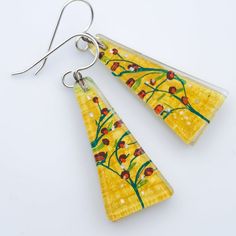 Vine is part of the FLORA&FAUNA collection. The warm summer colors bring to mind Tuscan landscapes, sunshine, mustard-colored stucco houses in the countryside.All of our dangle earrings are finished with premium Argentium silver wires and include a pair of silicone ear backs. Argentium silver is a step up from sterling silver; it is 100% nickel-free.Dimensions: 0.6" x 1.35" ; 15mm x 34mm Stucco Houses, Tuscan Landscaping, Fused Glass Earrings, Stucco Homes, Light Weight Jewelry, Climbing Vines, Flora Fauna, Boho Eclectic, Argentium Silver