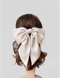 Material  Satin fabric, steel barrette  Description  Bow size: 9" width, 4.5" high  Tail size: 9" long  Barrette size: 3.89" You want the bow match your outfit or not sure it this the color you want please Contact me to get small Sample.  We have smaller size for shorter hair https://www.etsy.com/listing/1127471099/bridal-veil-bowswhite-satin-hair-bow?click_key=656ab344f2bf8c3632de3ed39252eca62877bbf0%3A1127471099&click_sum=571e6f70&ref=shop_home_active_14&crt=1&sts=1 custom   welcome, please contact me! Current processing time is 1-3 business days before shipping.  SHIPPING: All  orders are shipped USPS First Class Flat mailer with tracking information. Thank you for taking your time to visit Twin craft store.  I hope you find something you love  even for your family. Bun Bow, Beige Hair, Black Hair Clips, Big Hair Bows, Women Hair Accessories, Bow Women, Bow Bow, Pink Headbands, Bow Clip