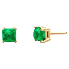 Introducing our exquisite 14 karat yellow gold Tiny Square Cabochon Emerald Stud Earrings, the epitome of elegance and sophistication. Crafted with precision and care, these delicate earrings are designed to adorn your second or third earlobe piercings with grace and style. Each earring features a mesmerizing square-shaped cabochon emerald, carefully selected for its vivid green hue and captivating beauty. These genuine emeralds weigh a total of 0.35 carats, adding a touch of luxurious color to your ensemble. The emeralds are set in a classic four-prong setting, allowing them to take center stage and showcase their natural beauty. The warm glow of the 14 karat yellow gold setting enhances the rich tones of the emeralds, creating a stunning contrast that catches the light with every movemen Gold Emerald Jewelry With Cabochon, Classic Yellow Gold Earrings With Emeralds, 14k Yellow Gold Earrings With Cabochon, Yellow Gold Cabochon Earrings In 14k Gold, Classic Emerald Earrings In Yellow Gold, Yellow Gold Emerald Cabochon Jewelry, Emerald Gemstone Earrings In Yellow Gold, Classic Yellow Gold Emerald Earrings, 14k Yellow Gold Cabochon Earrings