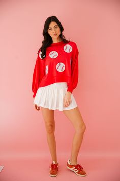 Score major style points with our BASEBALL PATCH RED PULLOVER! This cropped pullover features a striking red color and playful white baseball patches. And with its oversized fit, you'll feel comfortable and cool all season long. Home run! This is a made-to-order item. All customized orders are currently shipping within 14 business days. To receive item quicker, expedited shipping is available at checkout. Red Oversized Sporty Sweater, Spring Varsity Sweatshirt For Game Day, Red Sweatshirt With Ribbed Cuffs For Game Day, Red Tops With Ribbed Cuffs For Game Day, Collegiate Sweatshirt For Game Day In Spring, Red Sporty Sweatshirt For Game Day, Sporty Red Sweatshirt For Game Day, Red Pullover, Cropped Pullover