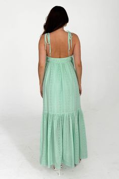 Sizing: Small- Length: 52 inches Medium- Length: 53 inches Large- Length: 54 inches Model Details: Model is wearing a small Model is 5'4 Model's waist is a 25 Model has a 32C bust Material: Tie straps Side ties Elastic waist band 100% Rayon Imported Hand Wash Cold. Lay Flat to Dry Fitted Green Maxi Dress With Adjustable Straps, Green Maxi Sundress With Adjustable Straps, Green Maxi Dress With Adjustable Straps, Green Maxi Dress With Tie Straps, Waist Band, Medium Length, Lay Flat, Elastic Waist, Hand Wash