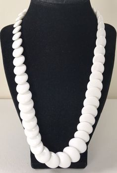 Beautiful white graduated round flat beaded necklace with gold tone closure .  Condition : new with tag . It measures 23 " length approximately . Brand : Trifari . Look at the pictures for description . If you have any question , please feel free to ask . DON'T FORGET TO CHECK OUT MY OTHER ITEMS ! ! ! & SAVE ME AS A FAVORITE SELLER ! ! ! Happy Bidding ! ! ! SAVE ON SHIPPING ON JEWELRY & CLOTHING !!! I do combine shipping on multiple jewelry purchases , will charge .30 ( 30 cents ) per each additional item . Also I do combine shipping on multiple clothing purchases , will charge $1 per each additional item . Once you added to cart the items that you want , you will see automatically shipping discounts at checkout . If you receive an error message on combined shipping from eBay , please cont White Beaded Necklace With Large Round Beads, White Beaded Necklace With Large Beads, White Beaded Necklaces With Large Beads, Antique Jewelry Necklace, Jewelry Clothing, Error Message, Vintage Watches, Antique Jewelry, Vintage Antiques