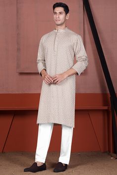 Introducing our exquisite Clam Shell Brown Embroidered Viscose Designer Kurta Set, a pinnacle of opulence and sophistication in the realm of festive wear. This kurta embodies understated luxury, perfectly suited for those who demand nothing less than the best. Be it Navratri or Diwali, give a new look to your festive style with our designer kurta set. Kurta Fabric: 100 % Premium Viscose / Cotton Thread Embroidery . Limited quantity, Seasonal collection. We change our fashion very frequently. Gra Cotton Thread Embroidery, Kurta Set For Men, Designer Kurta, Understated Luxury, Festive Wear, Clam Shell, Thread Embroidery, Kurta Set, Festival Wear