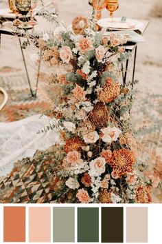 a table with flowers and candles on it in front of a desert landscape color palette