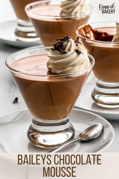 three desserts with whipped cream and chocolate in them on a white plate, the title says bailey's chocolate mousse