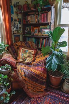 a living room filled with lots of plants and books