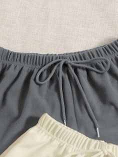 Discover ultimate comfort with our Pack Of 3 Solid Knot Lounge Shorts. These shorts redefine relaxation with their minimalist design, featuring a simple knot detail. Embrace the ease of movement with their short length and regular fit. Crafted from a knitted fabric with a slight stretch, they provide a personalized fit for your lounging moments. Features: Pattern Type: Plain Details: Knot Length: Short Fit Type: Regular Fit Fabric: Slight Stretch Material: Knitted Fabric Composition: 95% Polyest Casual Loungewear Shorts With Soft Texture, Soft Texture Shorts For Loungewear, Comfortable Soft Textured Short Bottoms, Soft-texture Shorts For Loungewear, Casual Soft Texture Shorts For Lounging, Solid Color Shorts With Elastic Waistband For Loungewear, Elastic Waistband Shorts For Loungewear, Casual Shorts With Soft Texture, Pajama Shorts With Drawstring For Loungewear