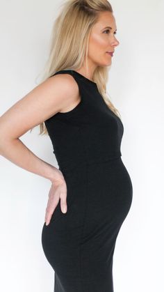 Made to empower women to breastfeed ANYWHERE in style and confidence, this dress will be your closet staple in those challenging early months (or years!) of motherhood. It’s beautifully designed and versatile — this dress looks great with heels and a blazer in the office or sneakers and a leather jacket for a more casual look. Did we mention it’s also bump friendly? Smart breastfeeding friendly panel Below-the-knee length 66% rayon from bamboo, 28% cotton, 6% spandex Machine wash cold, lay flat Fitted Sleeveless Maternity Dress, Bump Friendly, Fitted Bump Friendly Maternity Dresses, Fitted Bump-friendly Maternity Dress, Black Fitted Versatile Dress, Chic Fitted Maternity Dress, Spring Bump Friendly Black Maternity Dress, Chic Fitted Bump Friendly Dresses, Maternity Black Bump Friendly Dress, Maternity Black Bump-friendly Dress