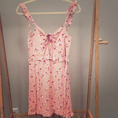 Cute Nwt Pink Floral Mini Dress With Tie At Bust And Ruffle Detail Straps, Size Medium. Cute Sleeveless Mini Dress For Brunch, Feminine Floral Print Sleeveless Dress For Brunch, Feminine Sleeveless Mini Dress For Brunch, Pink Floral Print Sleeveless Dress For Brunch, Cute Sleeveless Dress For Brunch, Cute Sleeveless Mini Dress For Daywear, Feminine Sleeveless Sundress For Daywear, Feminine Sleeveless Sundress With Floral Print, Floral Print Sleeveless Sundress For Daytime