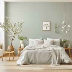 a bedroom with green walls and white bedding