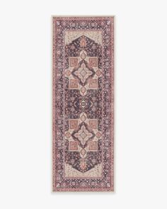 a rug with an intricate design on the bottom, and a pink border around it