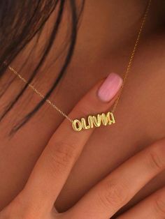 Discover the charm of our 3D Bubble Letters Necklace, featuring exquisite 14k gold mini bubble letters. This dainty nameplate necklace is perfect for showcasing your initials or a loved one's name, adding a playful yet elegant touch to any ensemble. The balloon-inspired design offers a unique and modern twist on traditional name jewelry. Product Details❣️ :Material: 925 Sterling Silver over 14k gold plated for lasting beauty and durability PENDANT SIZE 6MM🔥 Design: Mini bubble letters with a whimsical, airy feel Versatile: Ideal for everyday wear or special occasions Great for layering or as a standalone statement pieceGift this delightful necklace to yourself or someone special, and let their name shine in style. Order now and add a personal touch to your jewelry collection! Bubble Letter Necklace, Balloon Necklace, Letters Necklace, Name Plate Necklace, Bubble Necklace, Gold Bubbles, Bubble Letter, Bubble Necklaces, Gold G