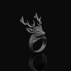 Silver Stag Head Ring, One of a Kind Antler Jewelry with Goth Style, Perfect Christmas Gift Gift for Deer Lovers & Goths Dive into a world where the raw elegance of nature meets the dark allure of gothic beauty. Our one-of-a-kind deer ring, inspired by the majestic stag, is more than just a piece of jewelry. It's a tribute to the untamed spirit of nature, encapsulated in shimmering silver. Designed for those who have an unwavering love for deer and their symbolic meanings, this ring also caters Deer Rings For Men, Stag Ring, Deer Ring, Stag Jewelry, Deer Pendant Necklace, Symbolic Meanings, Deer Antlers Necklace, Antler Design, Antler Jewelry