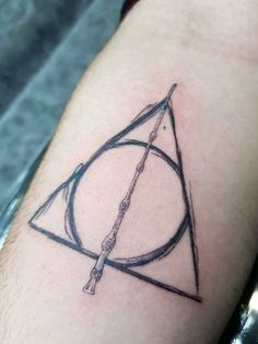 a harry potter tattoo on the arm