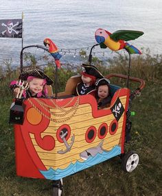 two children in a pirate boat costume