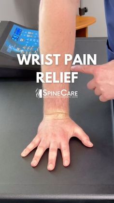 a person with their hand on top of a table that says wrist pain relief by pine care