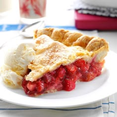 a piece of pie on a plate with ice cream