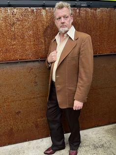 Classic 1970s mens 2 button Sportcoat in warm Carmel brown. Mod geometric off white and brown lining. High quality double knit in subtle diamond pattern. Wide rounded lapels, top stitching , side vents. Original metal enameled buttons at center front and sleeve cuffs. Partial lining on front and back panels. Overall this sport coat is in remarkably good condition, only signs of wear are on sleeve and side hems. Measurements are taken with garment flat in inches Chest 46 Shoulder seam to Shoulder Carmel Brown, Mens Sport Coat, Button Jacket, Double Knit, Blazers For Men, Jacket Buttons, Double Knitting, Top Stitching, Diamond Pattern