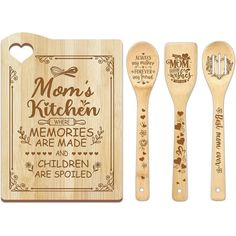 three wooden spoons, one with a mother's kitchen message and the other has a