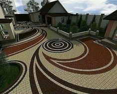 this is an image of a driveway in the middle of a house with circular designs on it