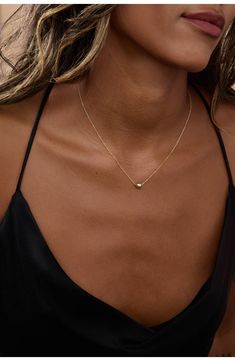 Polish your look with the simple, minimalist design of this delicate linked chain adorned with a solo gleaming bead slider. 16" length 14k-gold fill Made in the USA Caitlin Minimalist Jewelry, Simple 14k Gold-filled Necklace, Dainty Gold Solitaire Necklace For Everyday, Gold Minimalist Solitaire Necklace, Minimalist Gold Solitaire Necklace, Minimalist Solitaire Necklace With Adjustable Chain, Simple Gold Solitaire Necklace With Delicate Chain, Simple Solitaire Necklace With Delicate Gold Chain, Simple Everyday Solitaire Necklace