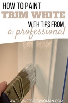 a person holding a paintbrush in their hand and the words how to paint trim white with tips from a professional