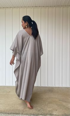 Unwind in absolute comfort with our semi sheer cotton gauze kaftan. This kaftan is perfect for the beach, pool, resort and laid-back time at home. Crafted from quality soft and breathable gauze cotton, it offers an airy fit that's ideal for lounging and cover up. Its relaxed design and easy slip-on style make it your go-to choice for outdoor cover up and relaxed nights at home. Summer Oversized V-neck Kaftan, Chic Oversized Kaftan For Beach Cover-up, Flowy Kaftan With Batwing Sleeves For Vacation, Flowy Batwing Sleeve Kaftan For Vacation, Summer Beach Maxi Dress With Batwing Sleeves, Oversized Batwing Sleeve Maxi Dress For Beach, Oversized Tunic Kaftan For Vacation, Flowy Linen Beach Dress Cover-up, Flowy Batwing Sleeve Kaftan For Beach Cover-up