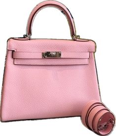 High-end Pink Rectangular Bag, High-end Handheld Satchel With Top Carry Handle, High-end Pink Handheld Bag, High-end Pink Shoulder Bag For Travel, High-end Pink Top Handle Satchel, High-end Pink Top Handle Box Bag, High-end Pink Box Bag With Top Handle, Luxury Top Handle Bag For On-the-go, Luxury On-the-go Bags With Top Handle