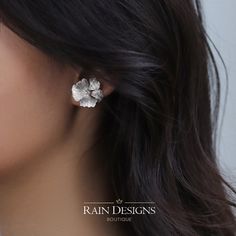 Peonies are known as the flower of riches and honor. With their lush, full, rounded bloom, peonies embody romance and prosperity and are regarded as an omen of good fortune and happy marriage. The peony earrings are meticulously handcrafted by our artists with high quality 925 sterling silver. The gold flower is 18K gold plated on 925 sterling silver. Size: approx. (W x L) 15 x 16mm • Handmade with love • Authentic 925 Sterling Silver • Natural Gemstones • Eco-friendly packaging • Great for Gift Silver Flower-shaped Bridal Earrings For Anniversary, Silver Flower Bridal Earrings For Anniversary, Elegant Blossom Jewelry For Anniversary, Elegant Wedding Earrings With Birth Flower, Elegant Jewelry With 3d Flowers For Anniversary, Blossom Color Sterling Silver Flower Jewelry, Blossom Flower-shaped Jewelry For Anniversary, Blossom Colored Flower-shaped Sterling Silver Jewelry, Silver Flower Earrings For Wedding