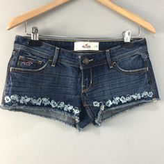 Hollister Denim Shorts Cutoffs Embroidered Size 3 Cutoffs With Embroidered Flowers Along The Hem, Factory Distressed. Never Worn, With Tags. Measurements: Waist Flat 16" Inseam 2" Rise 6" Ho2911b Embroidered Medium Wash Denim Jean Shorts, Embroidered Denim Blue Jean Shorts, Embroidered Dark Wash Bottoms For Summer, Dark Wash Embroidered Bottoms For Summer, Embroidered Denim Jean Shorts In Blue, Embroidered Short Length Medium Wash Jeans, Blue Cutoff Jean Shorts With Floral Embroidery, Medium Wash Embroidered Short Jeans, Blue Floral Embroidered Cutoff Jean Shorts