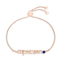 a rose gold bracelet with the word recip written in cursive writing on it