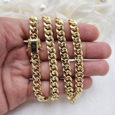 Stunning semi solid 14k yellow gold 7.5MM thick miami cuban chain. Perfect for everyday and every occasion. Sturdy, versatile, and everlasting. 14k gold will not tarnish or rust. Perfect gift. Materials: 14k gold Lenght: 22 inches, 24 inches Thickness: 7.5MM Weight: 35.1 grams, 39 grams (Aprox). 14k stamped Box lock Shipping with UPS,, a signature will be required. Briza Collections is a small family business that works hard on providing the best selection of Fine Solid Gold Jewelry for the best Luxury Yellow Gold Cuban Link Jewelry, Luxury Cuban Link Necklace With Solid Link Construction, Yellow Gold Cuban Link Necklace Tarnish Resistant, Tarnish Resistant Yellow Gold Cuban Link Necklace, 14k Yellow Gold Cuban Link Chain Bracelet, 14k Gold Cuban Link Necklace With Curb Chain, Luxury Yellow Gold Cuban Link Necklace, 14k Yellow Gold Cuban Link Necklace, Gold Cuban Link Necklace In 14k Gold