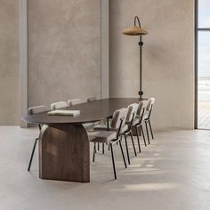 a table with chairs and a book on it