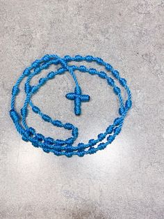 Hello and thanks for stopping by! My rosaries are handmade from knotted nylon cord. These knotted rosaries are durable, high-quality, easy to carry, lightweight. and made with so much love! This rosary is a beautiful, vibrant yet soft  blue, as Mary is often portrayed as wearing in art.  Now with the option to add a Saint or Marian medal! All available medals are notated in the listing photos. Miraculous Medals (shown) have the size option of Regular or Small. All other medals come in size Regul Adjustable Blue Beaded Rosary, Adjustable Blue Rosary With Miraculous Medal, Adjustable Blue Rosary With 8mm Beads, Knotted Rosary, Special Prayers, Saints Medals, Miraculous Medal, So Much Love, Rosary