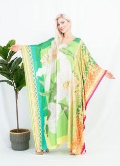 A silk blend kaftan featured the art prints inspired  Renaissance styles with lilies and the art frames, will be perfect for your holidays stay and to any occasions you attend. It's totally smoothly flowy, soft and gentle touch. FEATURES - Green, White, Yellow - Lilies Floral, and Rococo art frame - Personal Custom Made - Full Length Kaftan Long Sleeves - Designer Silk Kaftan - Plus Size and Custom Length - Resort Wear, Beach Wear, Maxi Kaftan Cruise Wear, Vacation Caftan - Boat Neck Kaftan - Po Green Floral Print Maxi Kaftan, Long Floral Print Patterned Kaftan, Long Patterned Kaftan With Floral Print, Long Floral Patterned Kaftan, Green Long Printed Kaftan, Green Bohemian Kaftan With Floral Print, Long Green Floral Print Kaftan, Green Printed Free Size Kaftan, Green Printed Free-size Kaftan