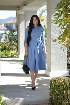 The newest addition to our Pink Label line, our Santorini dress, was an immediate favorite! Made in the most universally flattering cut there is, the Santorini dress features 3/4 sleeves and a beautifully cinched waist skirted in box pleats. A modest but super flattering ""V"" neckline adds a feminine touch and the the Blue Long Sleeve Dress With Pleated Skirt, Modest Spring Dresses With Modesty Panel, Modest Pleated Waist Midi Dress For Spring, Modest Spring Midi Dress With Pleated Waist, Modest Fitted Midi Dress With Pleated Waist, Long Sleeve Dresses With Box Pleat For Work, Modest Pleated Midi Dress, Long Sleeve Gathered Skirt Fall Dress, Long Sleeve Dress With Gathered Skirt For Fall