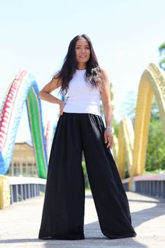 All items are shipped Thailand Post .Free upgrade to D.H.L Express when you buy 2 or more. The USA only. Made in 100% cotton soft , light and very comfy . These bell bottom pants have a cute design . They allow you to adjust the bottom of the hemline with 4 ties on the inside of the leg . Tighten the ties to create a draped look or tie loosely for a bell-bottom hemline. Fantastic flare of 54''inches . The pants are half lined with an elastic waist band. They flare out 54'' inches at the hemline Full Length Cotton Wide Leg Pants, Cotton Stretch Wide-leg Bottoms, Wide Leg Cotton Pants With Loosely Fitted Hips, Non-stretch Wide Leg Cotton Pants, Wide Leg Cotton Pants With Elastic Waistband, Non-stretch Cotton Wide Leg Pants, Stretch Cotton Wide-leg Pants, Flared Cotton Loungewear Bottoms, Wide Leg Stretch Cotton Pants