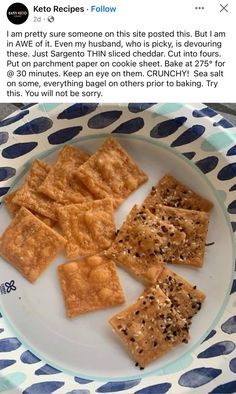 some crackers are on a white and blue plate