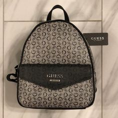 Women’s Guess Mini Backpack Price Is Firm At $60. Color: Gray/Black Condition: 10/10 New W Tags Mochila Guess, Guess Backpack, Vegan Leather Backpack, My Style Bags, Quilted Backpack, Browning Logo, Guess Bags, Convertible Backpack, Bags Logo